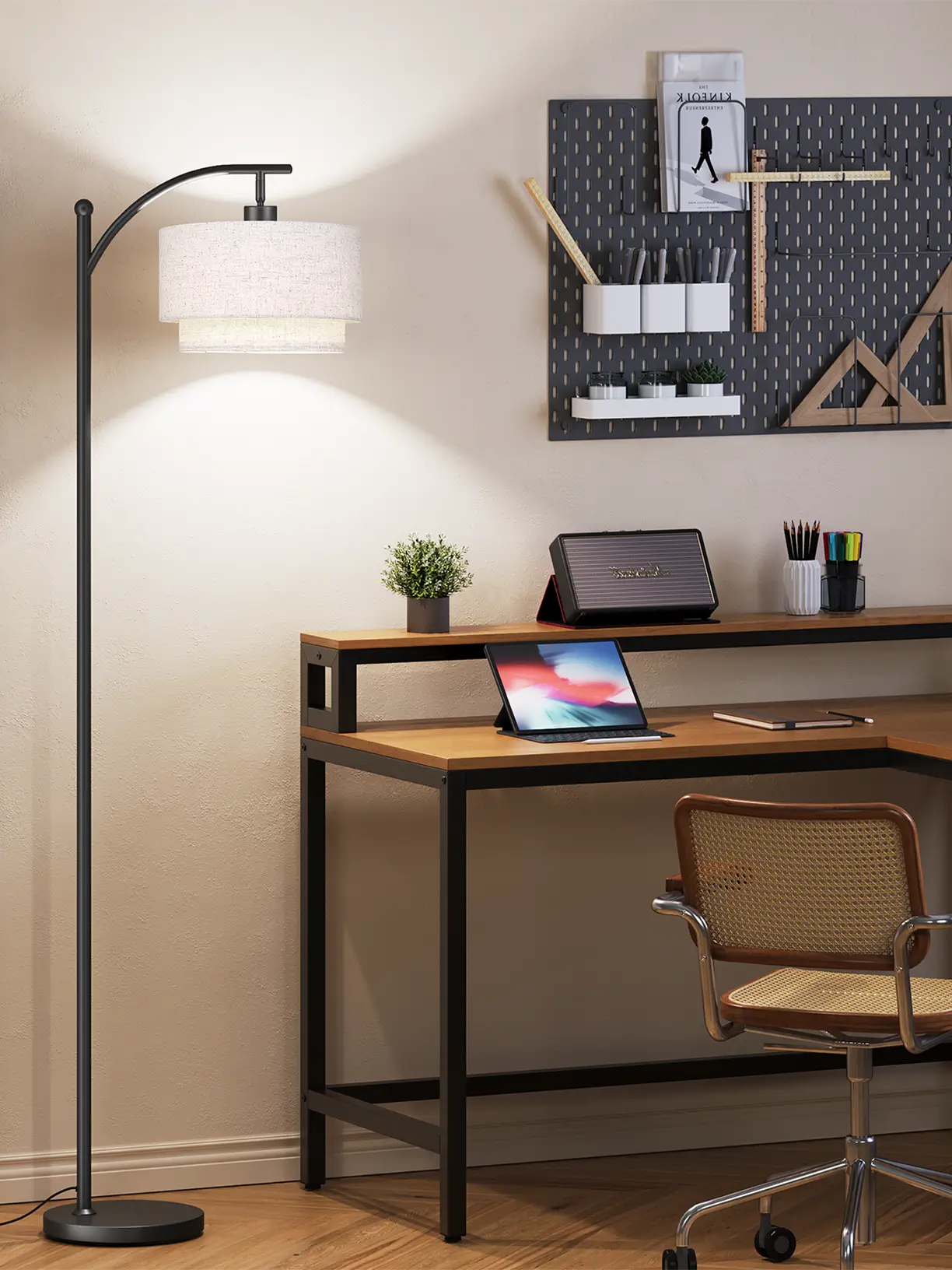 An arc floor lamp with an adjustable angle feature and a wide, open-mouthed shade, providing versatile and direct lighting in a bright, modern interior.