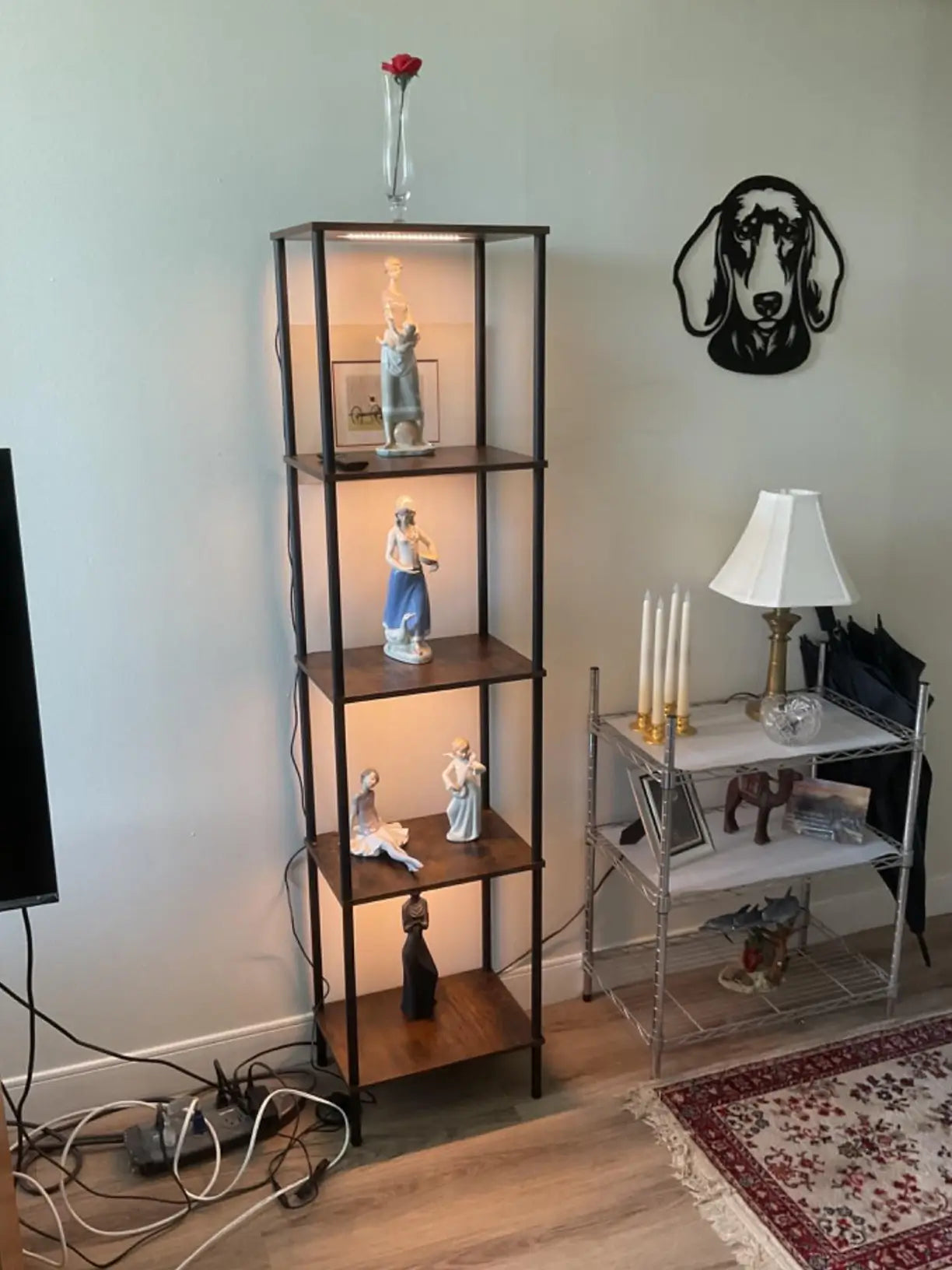 A contemporary display shelf with integrated adjustable lighting strips, creating a bright and elegant showcase for high-value items or cherished possessions.
