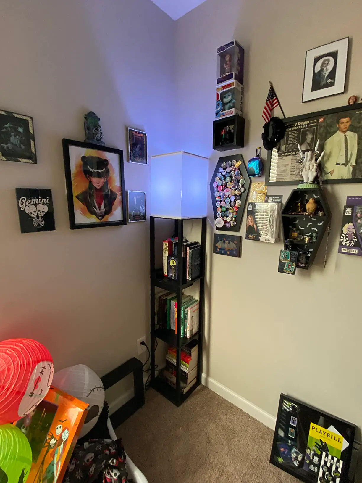 A dimmable RGB floor lamp emitting a dynamic red-orange glow, perfect for enhancing the atmosphere of a gaming room or entertainment area with customizable lighting.