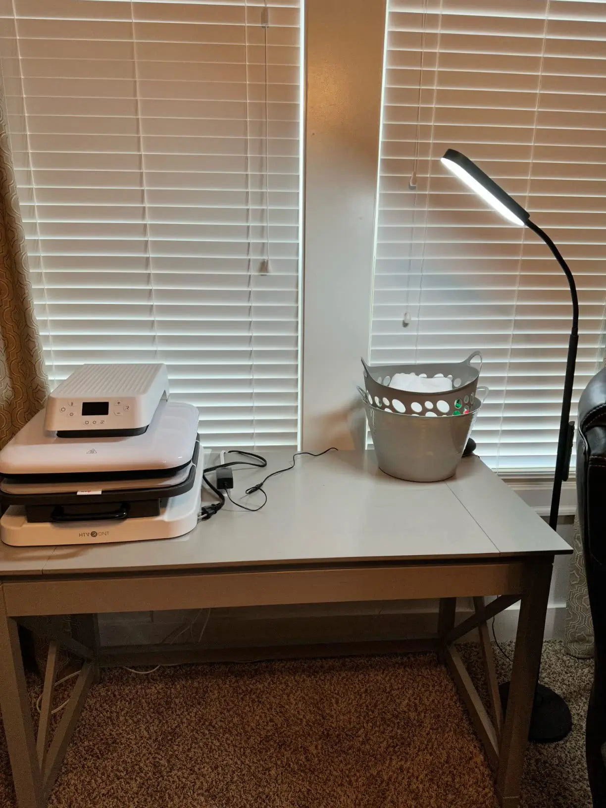 A minimalist LED reading floor lamp with a slim, straight design and a small, powerful light head, perfect for subtle yet effective task lighting next to a sofa or desk.
