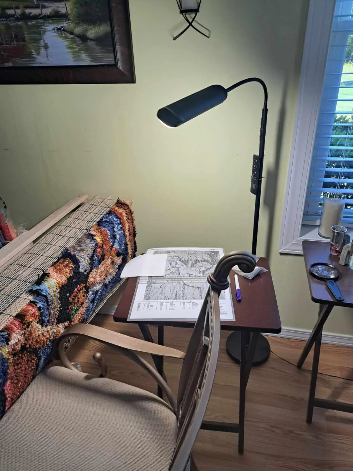 A slim and unobtrusive LED reading floor lamp, casting a clear light, perfect for a modern home office or a minimalist living space where focused illumination is key.