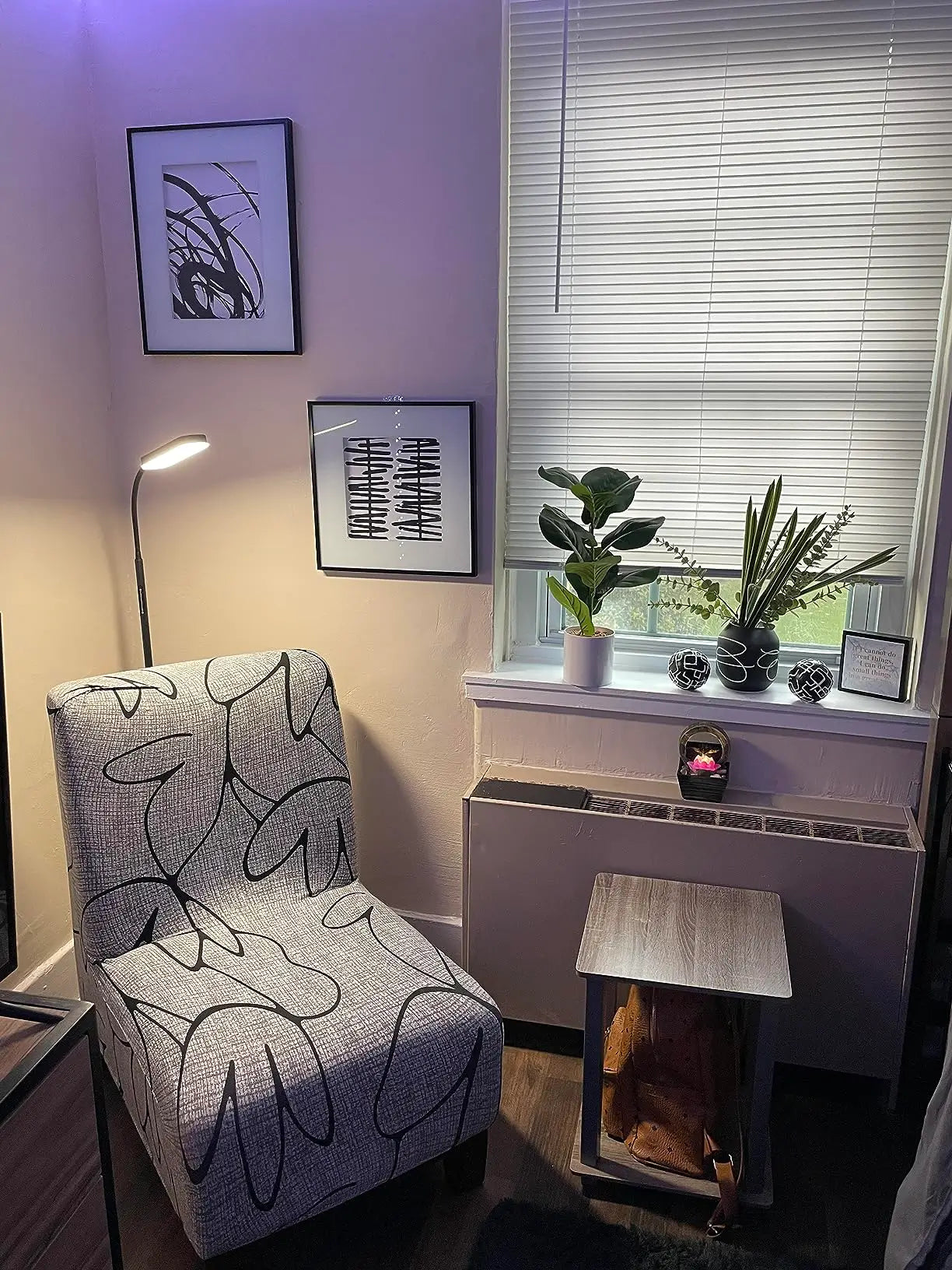A contemporary silver LED reading floor lamp featuring a slender frame and a compact light, offering dimmable, eye-friendly illumination for comfortable reading.