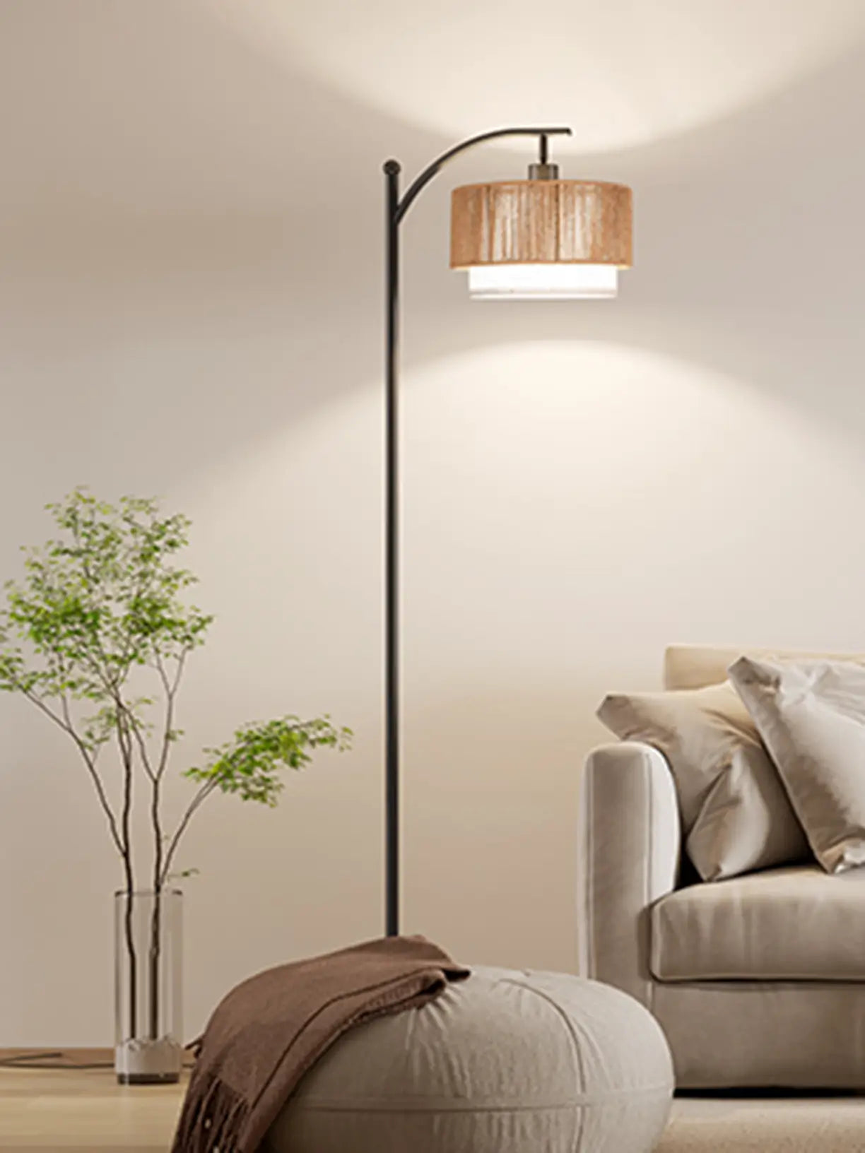 A close-up view of a minimalist double lampshade floor lamp, highlighting its two distinct shades and the clean lines of its design, suitable for modern decor.